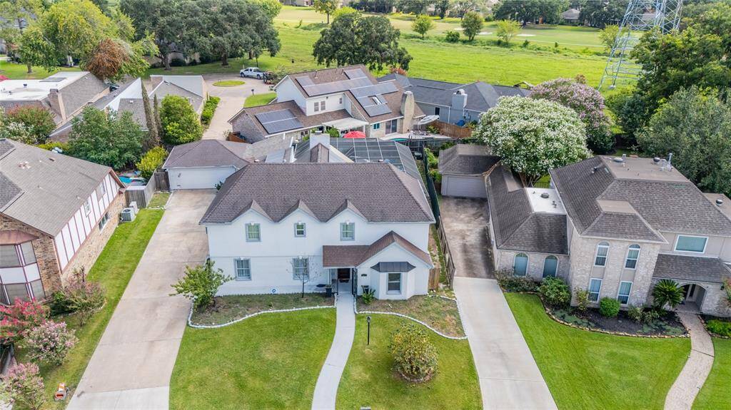 Another perspective of its layout and design. This angle highlights the home's flow, outdoor spaces, and how different areas connect, offering a comprehensive look at the overall structure and its relationship with the surrounding environment.