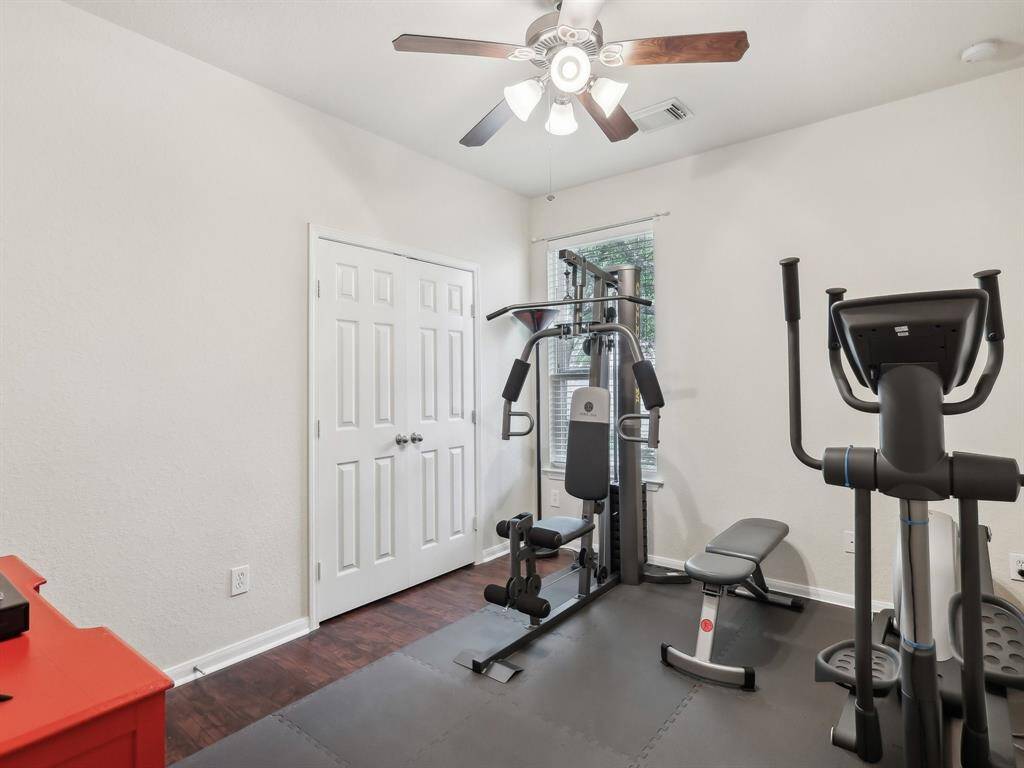 Bedroom 3 is being used as a workout room.