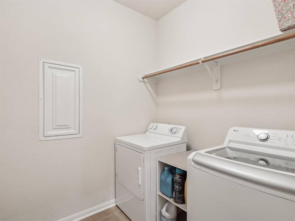 This laundry room is complete with a PEX manifold, so no need to shut off the water to the entire home!