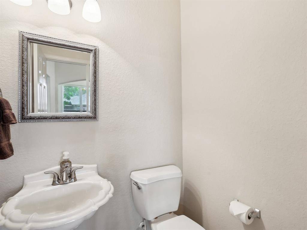 The half bath is perfectly positioned for easy access for your guests.