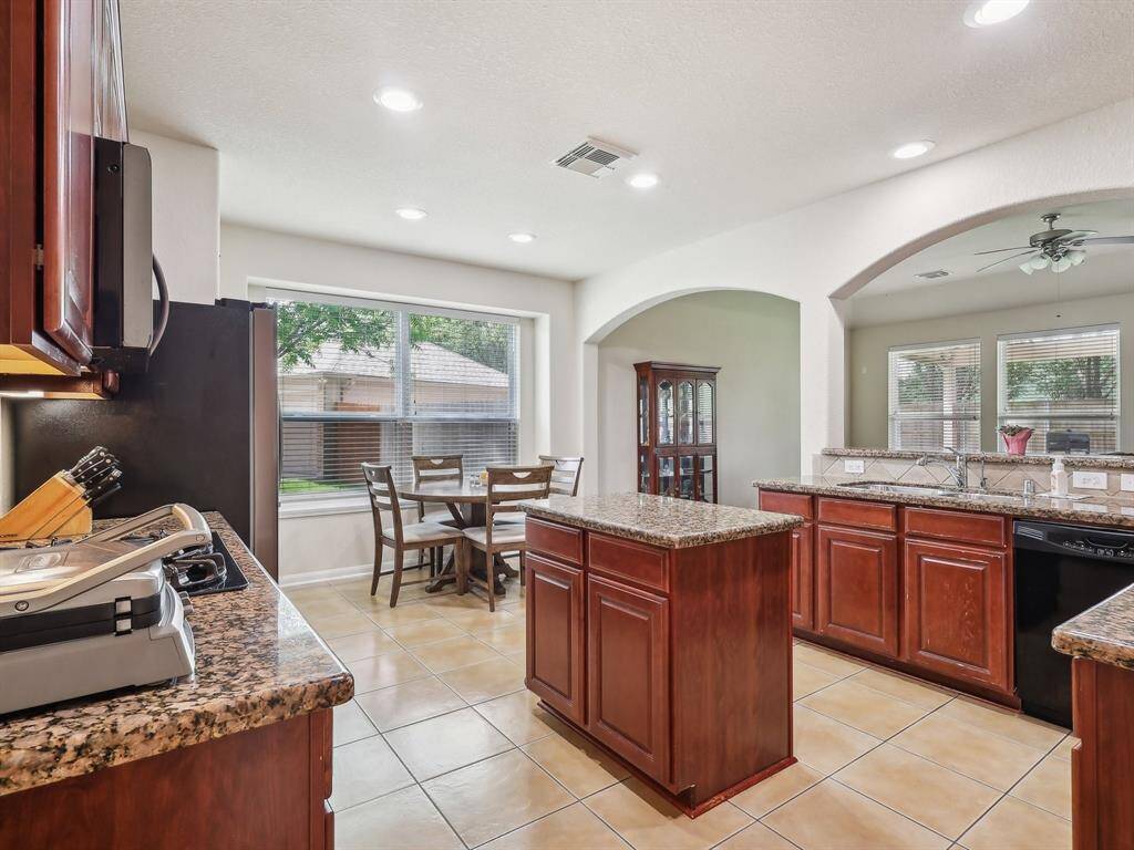 This Kitchen has an abundance of cabinetry and counter space.