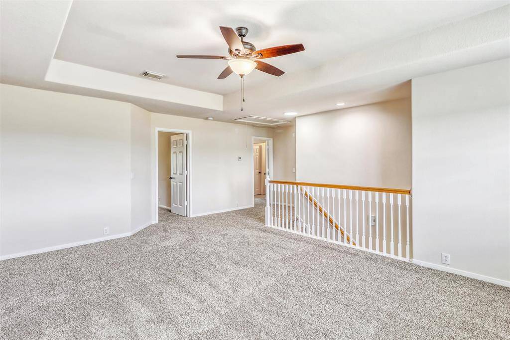 Upstairs upgrades include newly installed carpet and stylish, upgraded ceiling fans, adding both comfort and modern touches to the space.
