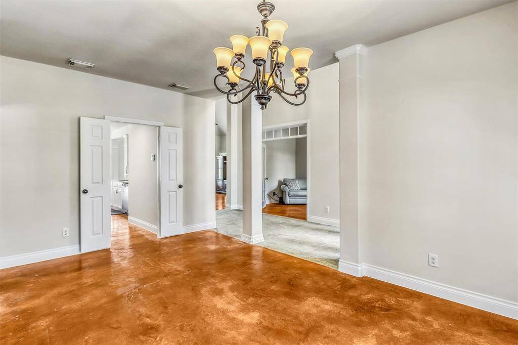Designed for both style and function, this formal dining room offers ample space for a large table and seating, along with a generous wall perfect for showcasing artwork or housing a china cabinet. Convenient double doors provide direct access to the kitchen, making entertaining a breeze.