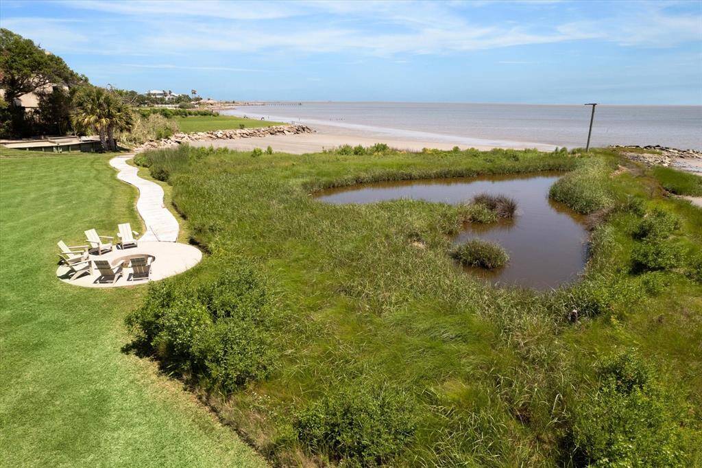 Just down the hill from the pool is a fire pit and coastal pond with unobstructed views of the entire bay, where you can watch a variety of seabirds in their native habitat.