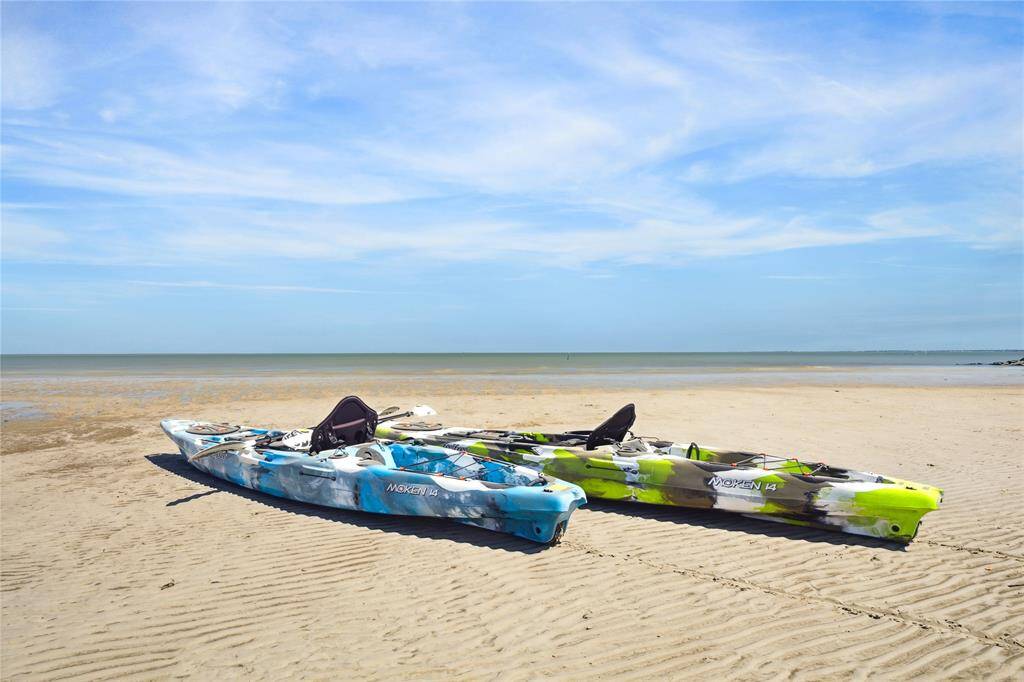 Kayak into the bay right from your own shore! Two kayaks pictured here convey with the home.