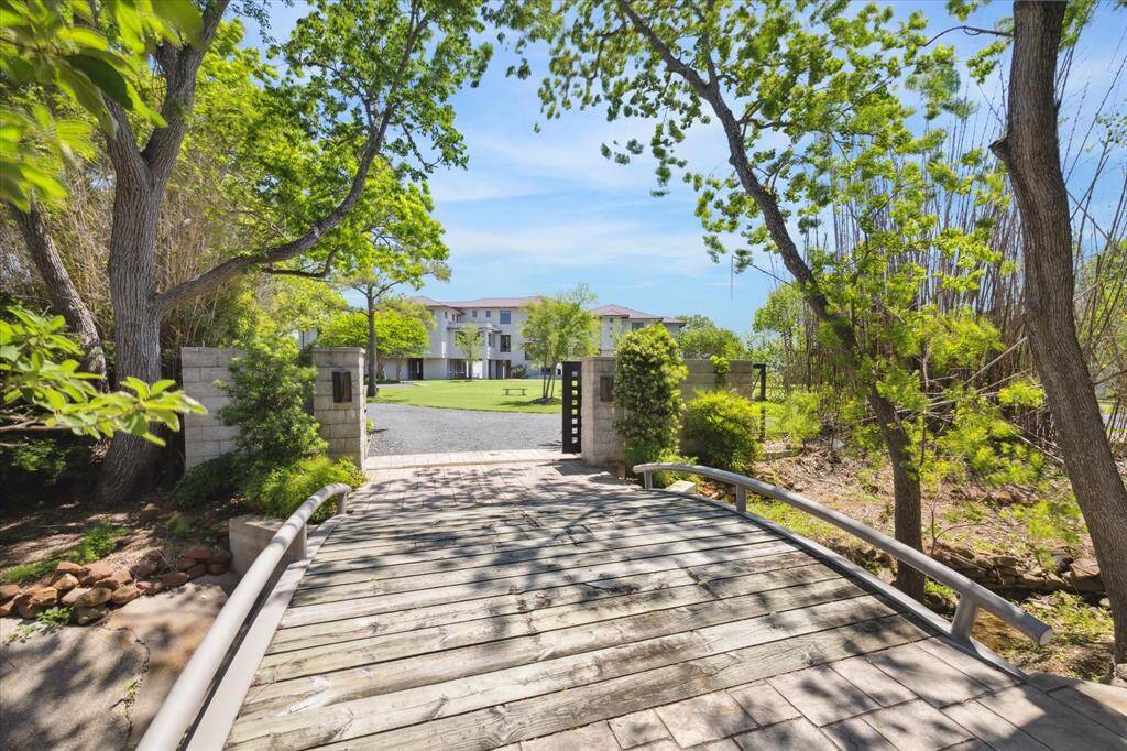 Behind a private and secure entry gate awaits a one-of-a-kind retreat!