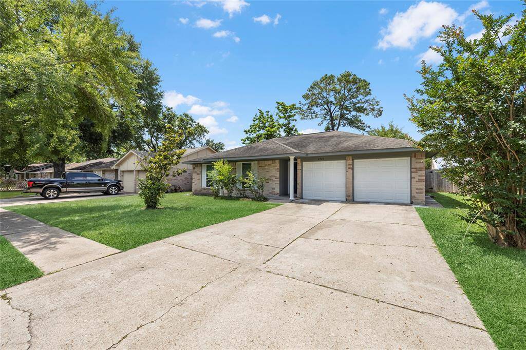 Spacious and inviting, this Houston home boasts curb appeal and comfort.