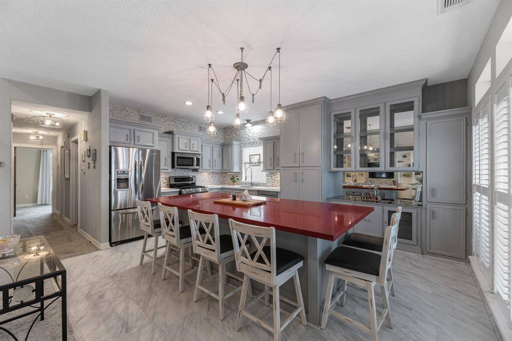 This modern kitchen features large island, making it perfect for entertaining.