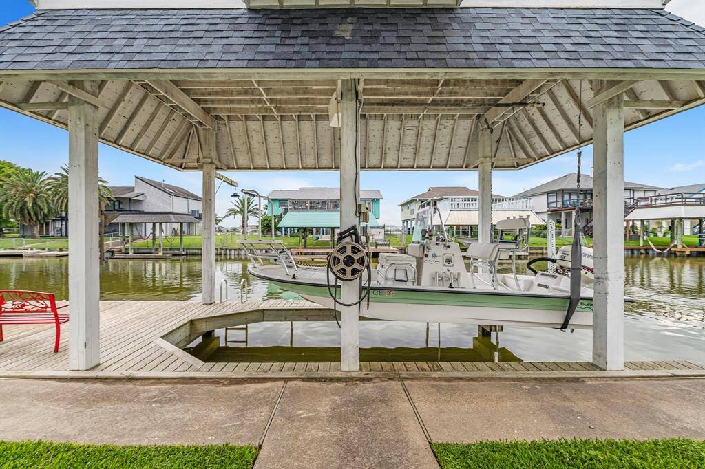 2018 boathouse with a spacious deck, perfect for waterfront living and leisure activities.