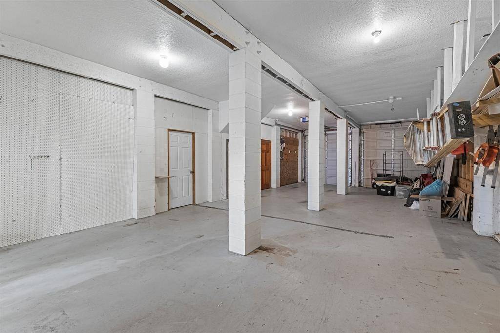 Oversized garage. Plenty of room for 2 cars & a golf cart.
