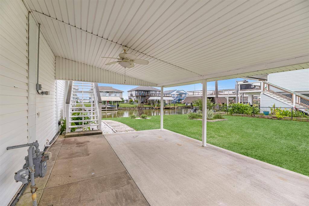 Spacious covered patio ideal for outdoor relaxation and entertaining.