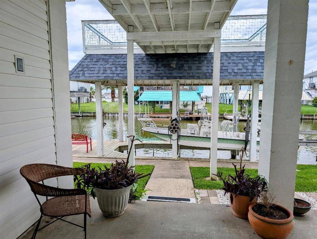 Waterfront patio with view of the canal. Patio is pre-wired for a hot tub!