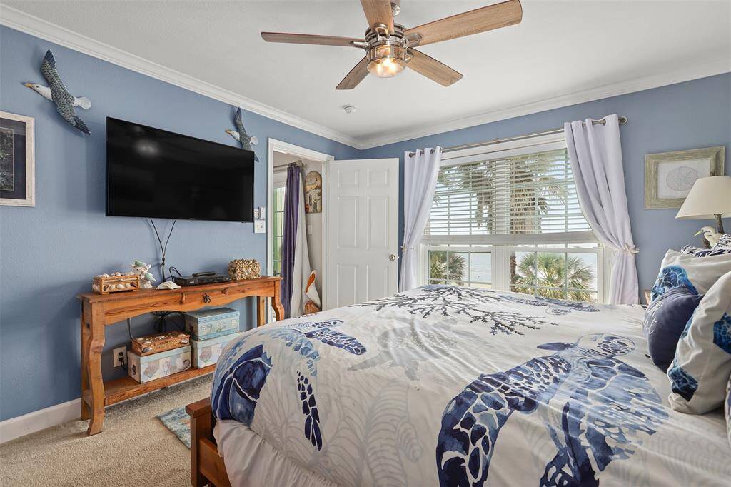 Primary bedroom has those great Gulf views.
