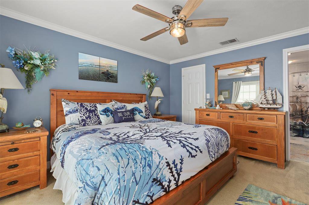 Primary bedroom has a walk-in closet and ensuite access to bath.