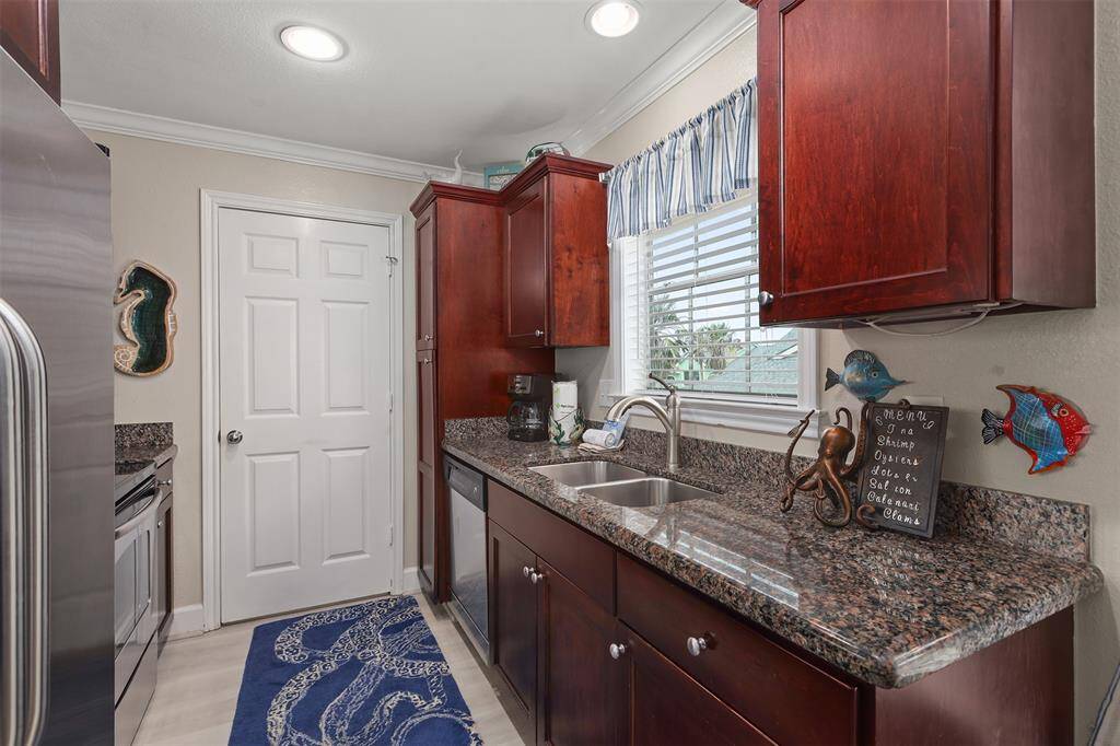Stylish galley kitchen has all the essentials.