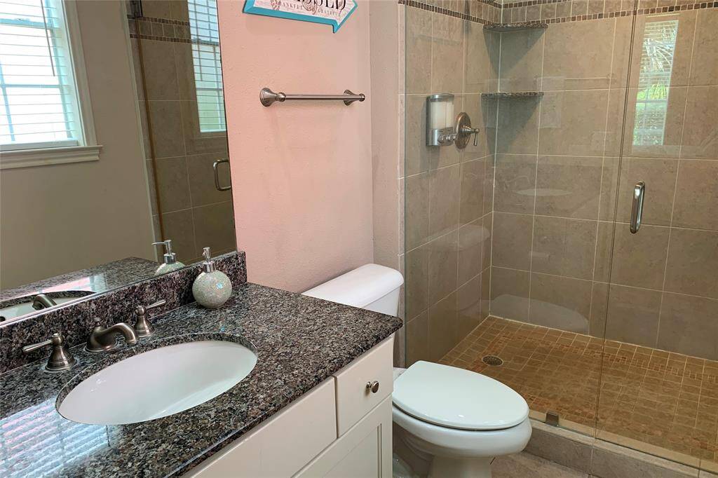 Primary bath has nice walk-in shower.