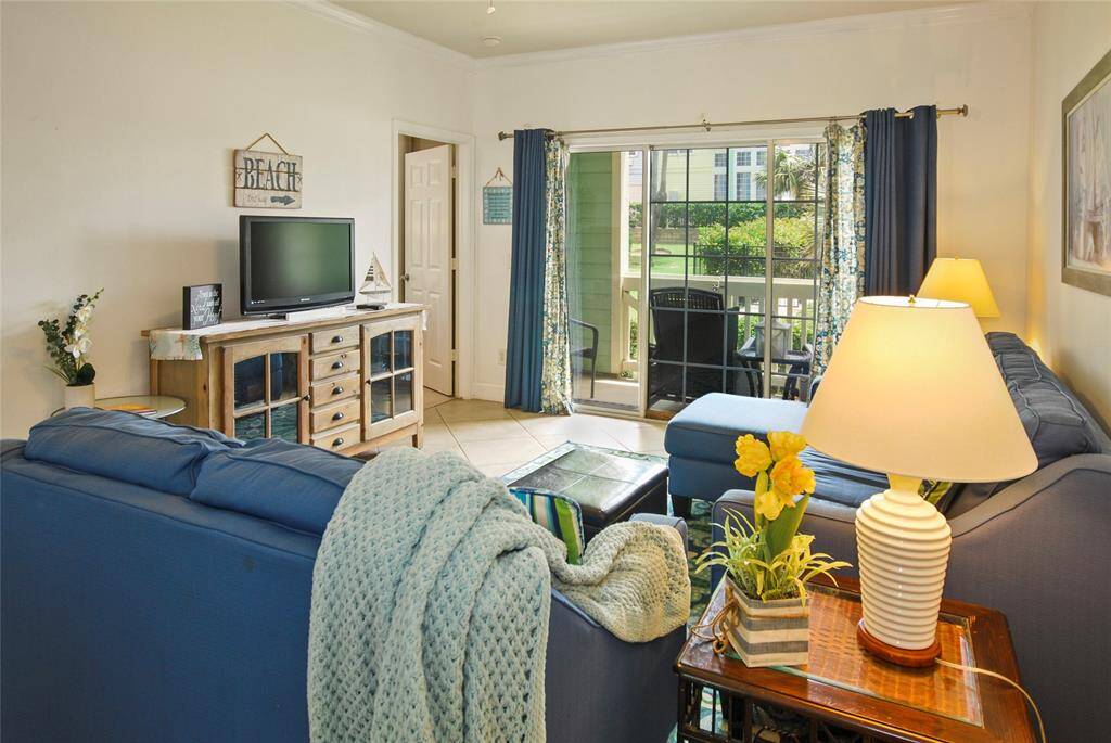 Nice-sized living room accommodates bigger furniture.
