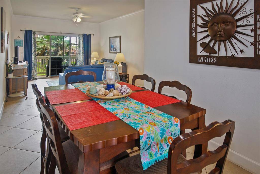 Dining area conveniently located between living room and kitchen.