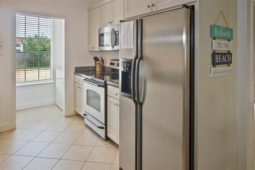All appliances in kitchen included in the sale.