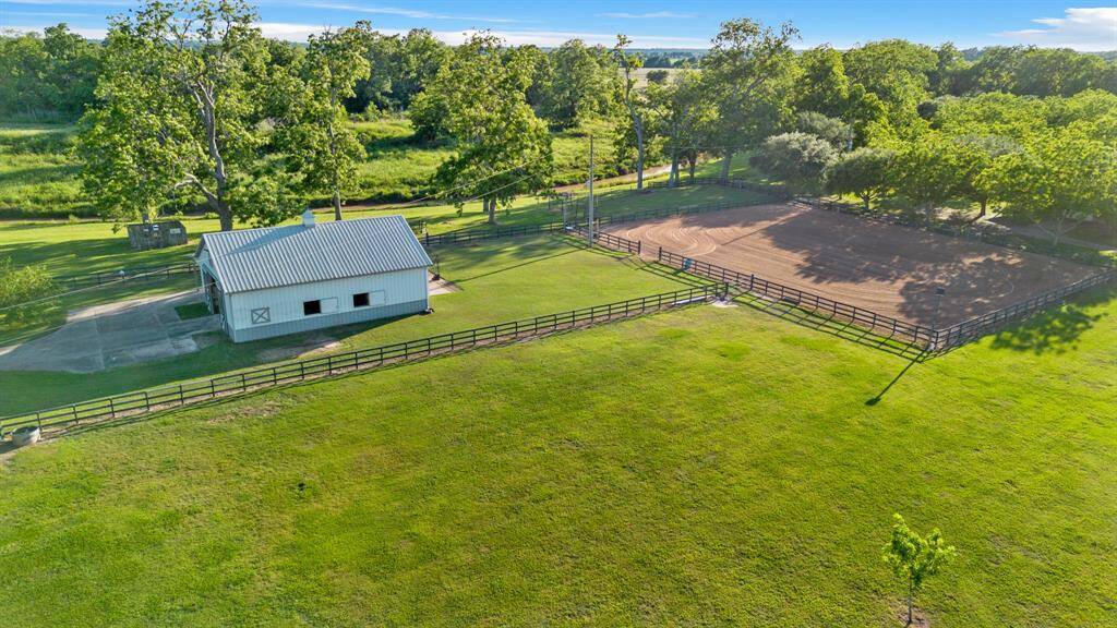 Pristine riding arena & fenced pastures.