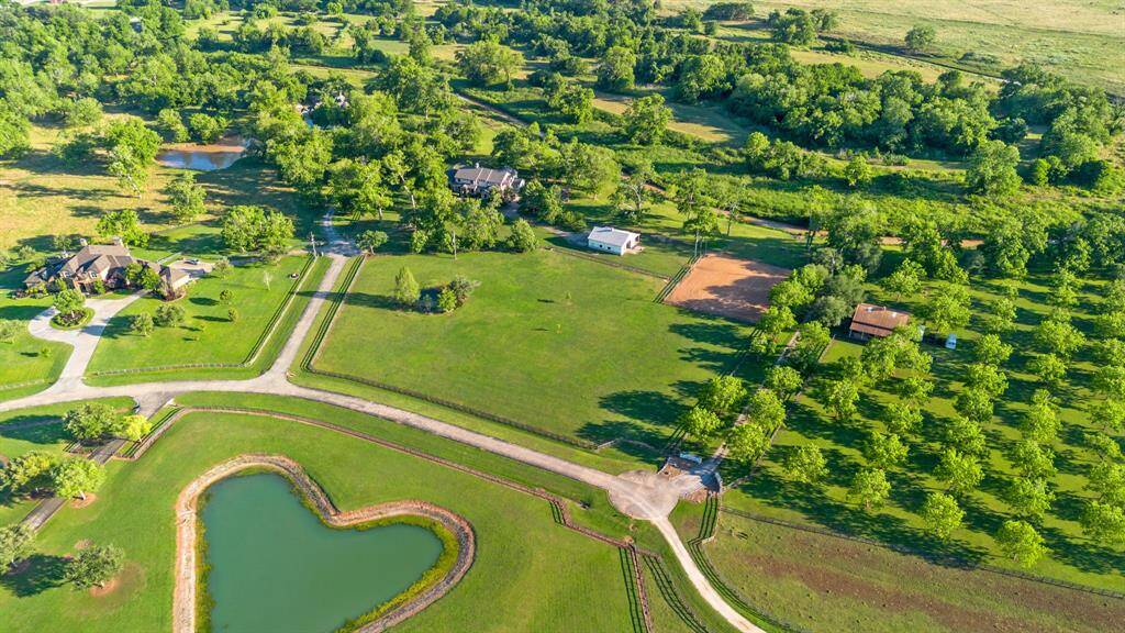 Set on almost 10 gorgeous acres backing up to Jones Creek.