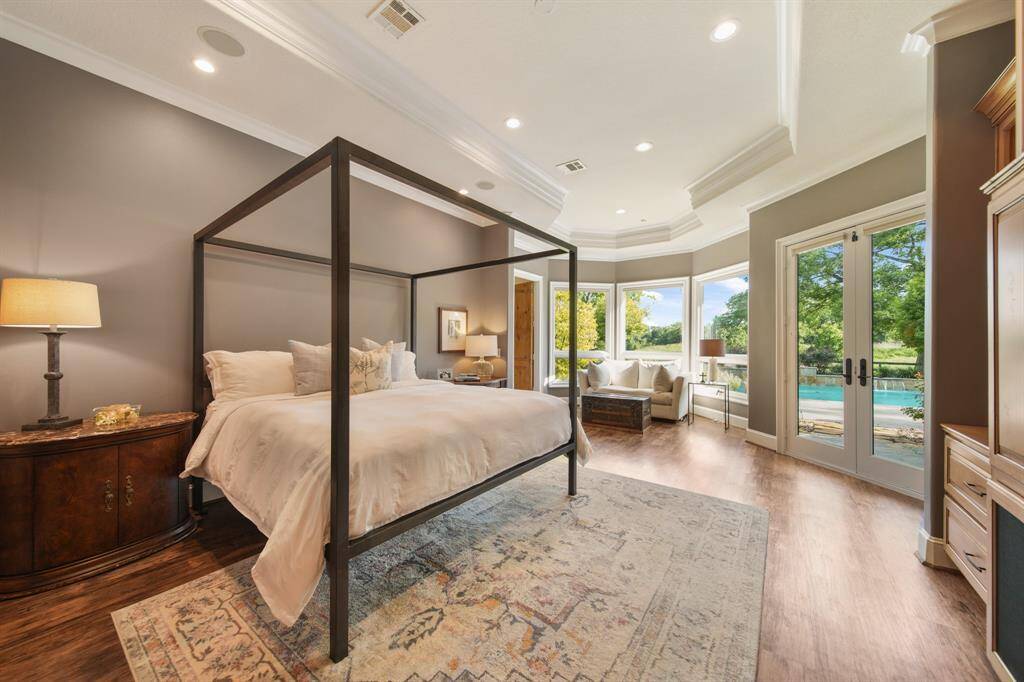 Oversized primary bedroom with beautiful sitting area.