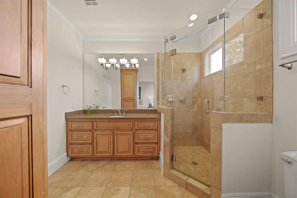 Upstairs ensuite bathroom #2 with shower.