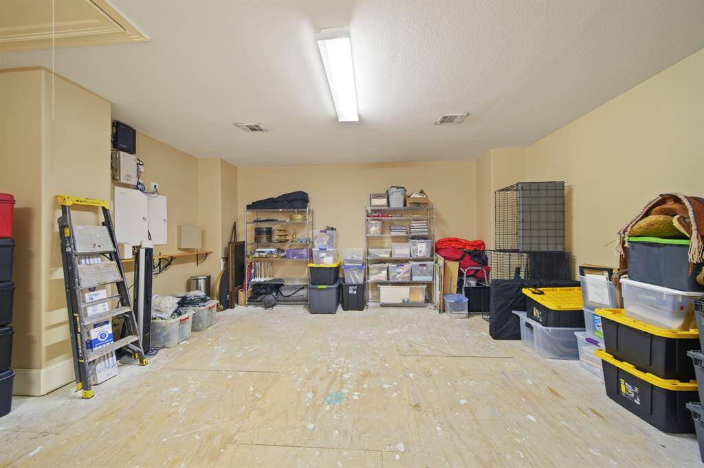 Unbelievable upstairs storage...could be converted into another flex room.