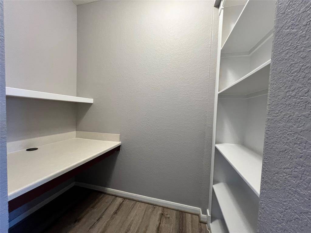 Do you work from home?  This office nook is the perfect space with built-in shelves and desk.