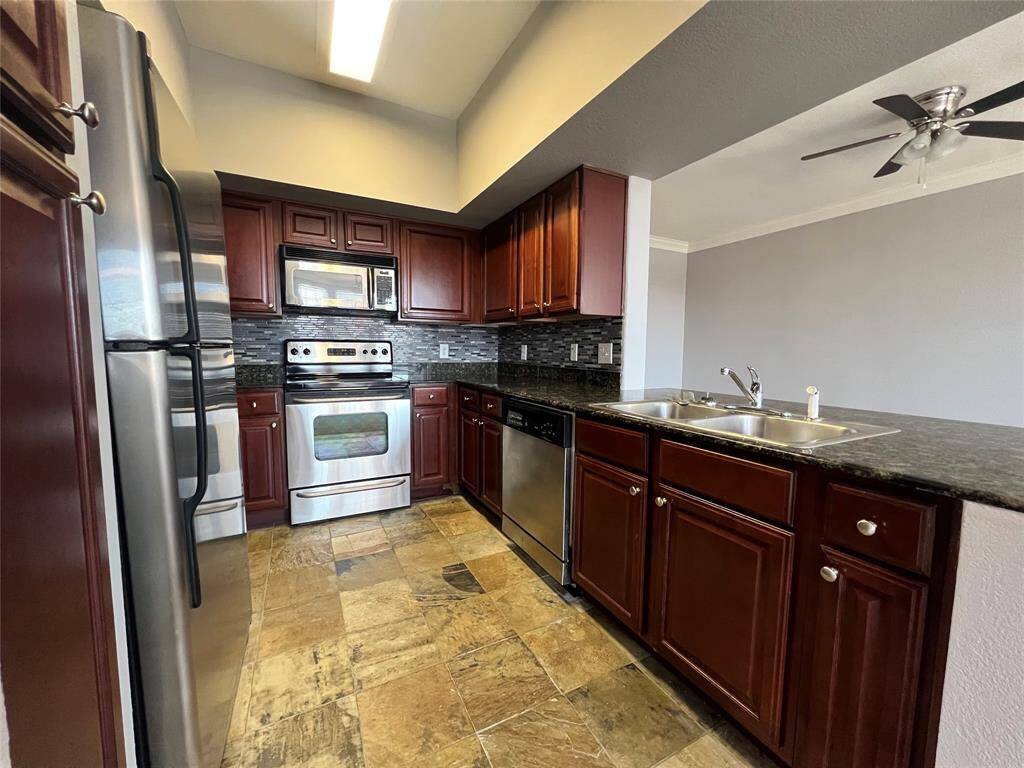 The spacious kitchen also has a breakfast bar for extra seating.