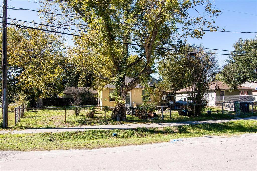 Massive Corner Lot Holds An Incredible Opportunity To Make This Your Own