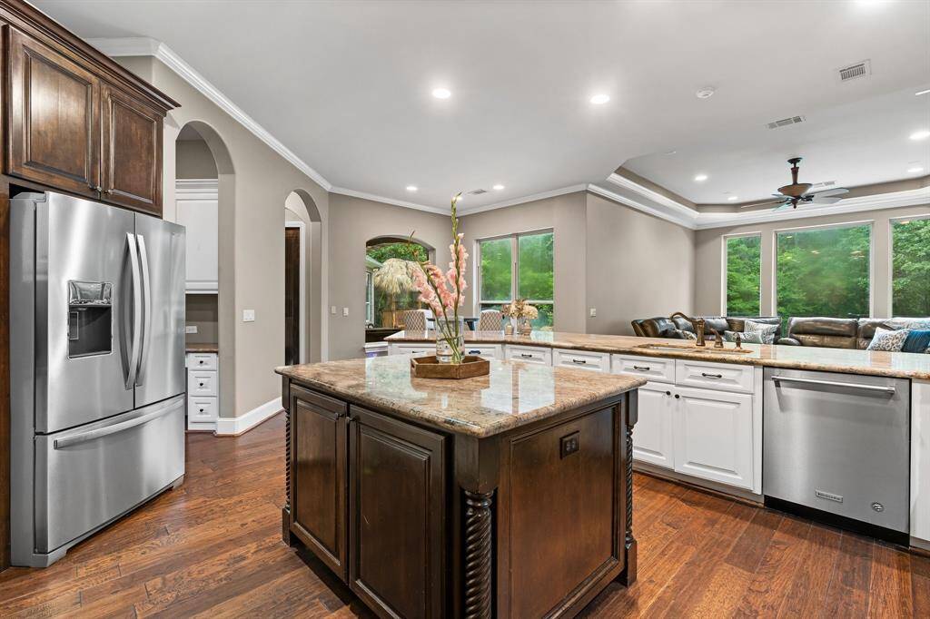 View in kitchen looking into breakfast room and entry.