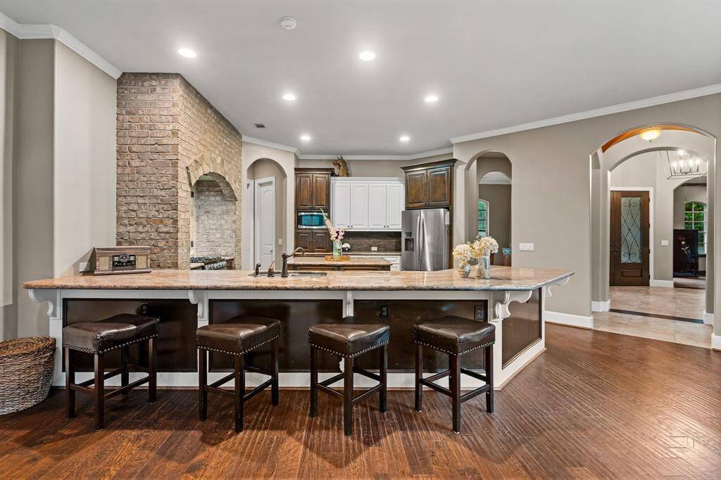 Kitchen with views into the entry.