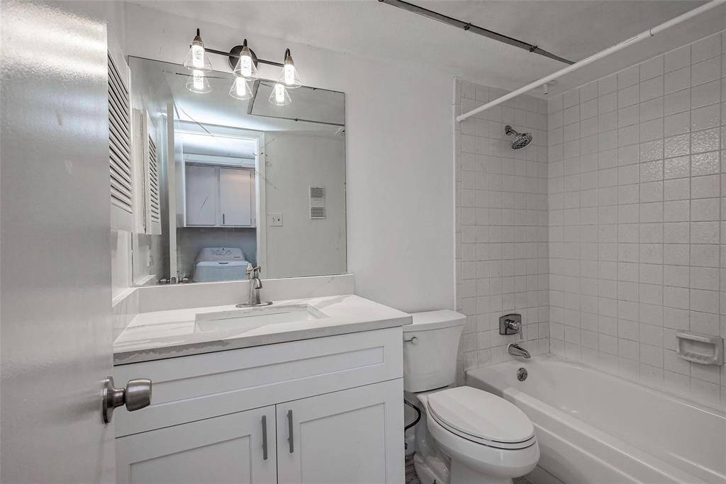 Totally upgraded Restroom with brand new sink, toilet and white soft close cabinet