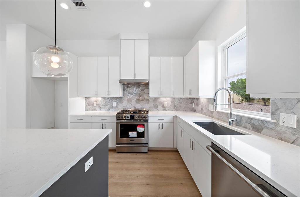 Quartz countertops, designer tile and soft close shaker style cabinets are all a staple of Riverway homes within Spring Valley Creek.