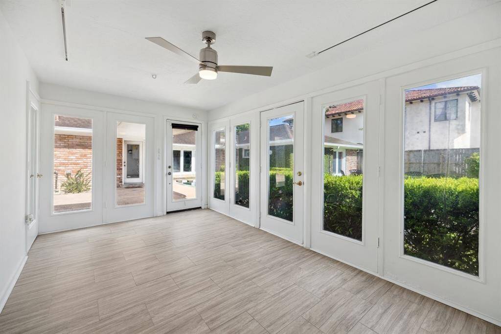 Guest apartment with 1 bed 1bath attached to the garage.  Would make a great pool house too.