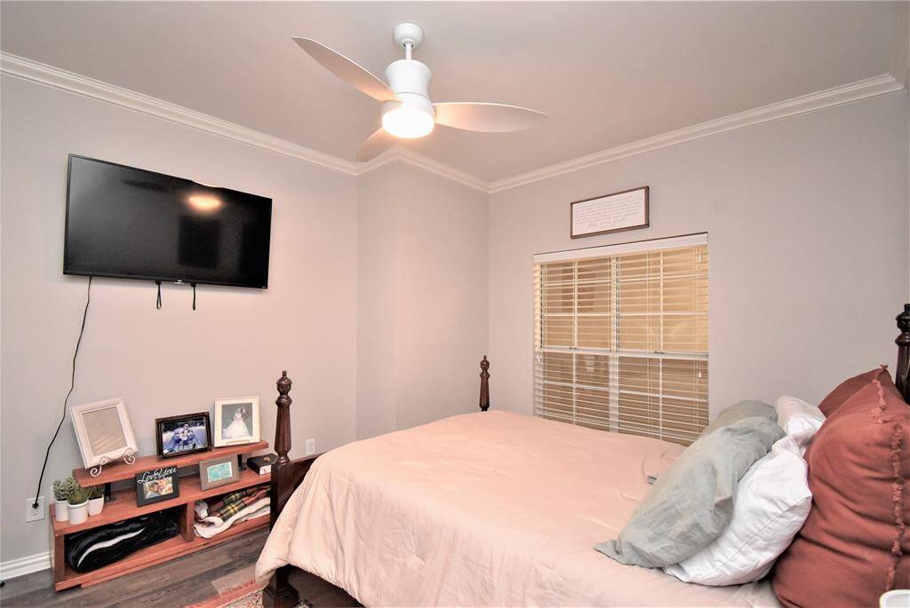 This bedroom has its own entertainment space, a perfect room for relaxation and entertainment