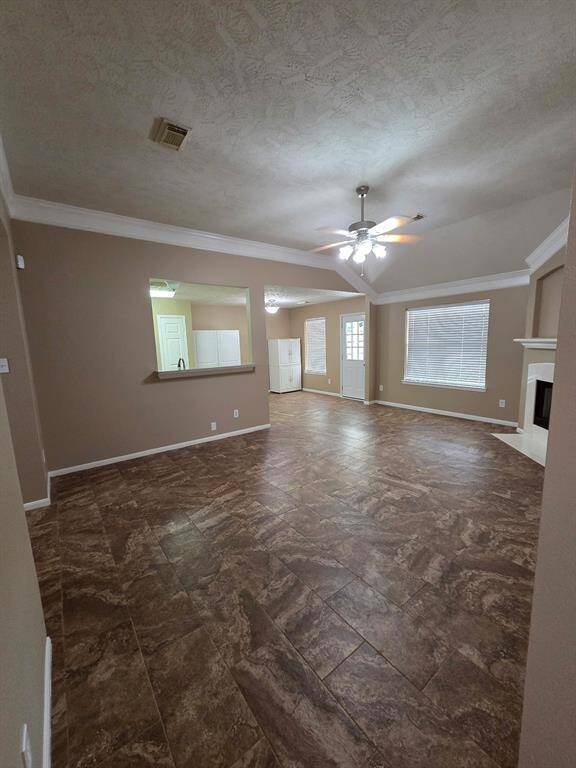 large den with wood fireplace
