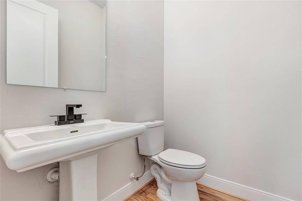 A half bathroom is conveniently located on the second floor.