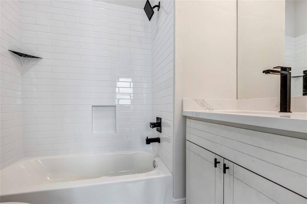The guest bedroom on the third floor has an en-suite bathroom.
