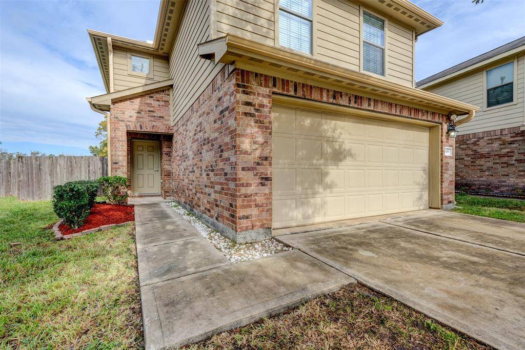 Front ExteriorWelcoming curb appeal with a brick façade, landscaped walkway, and attached two-car garage in a quiet, family-friendly neighborhood.