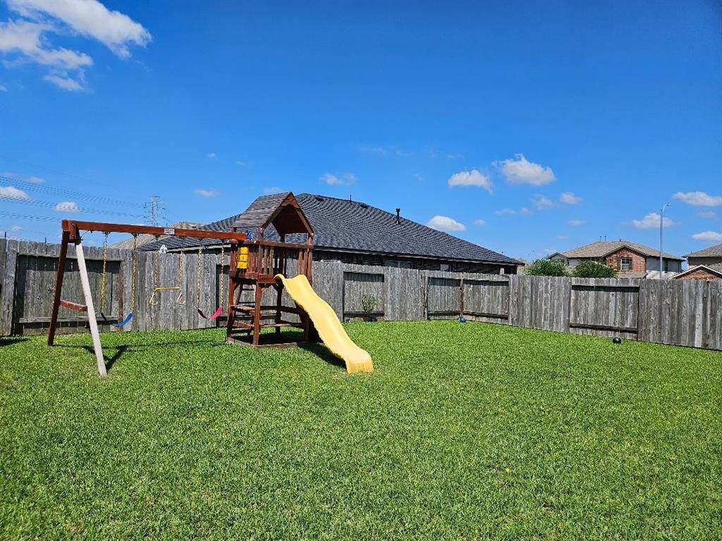 Spacious Back Yard Fully Fenced.