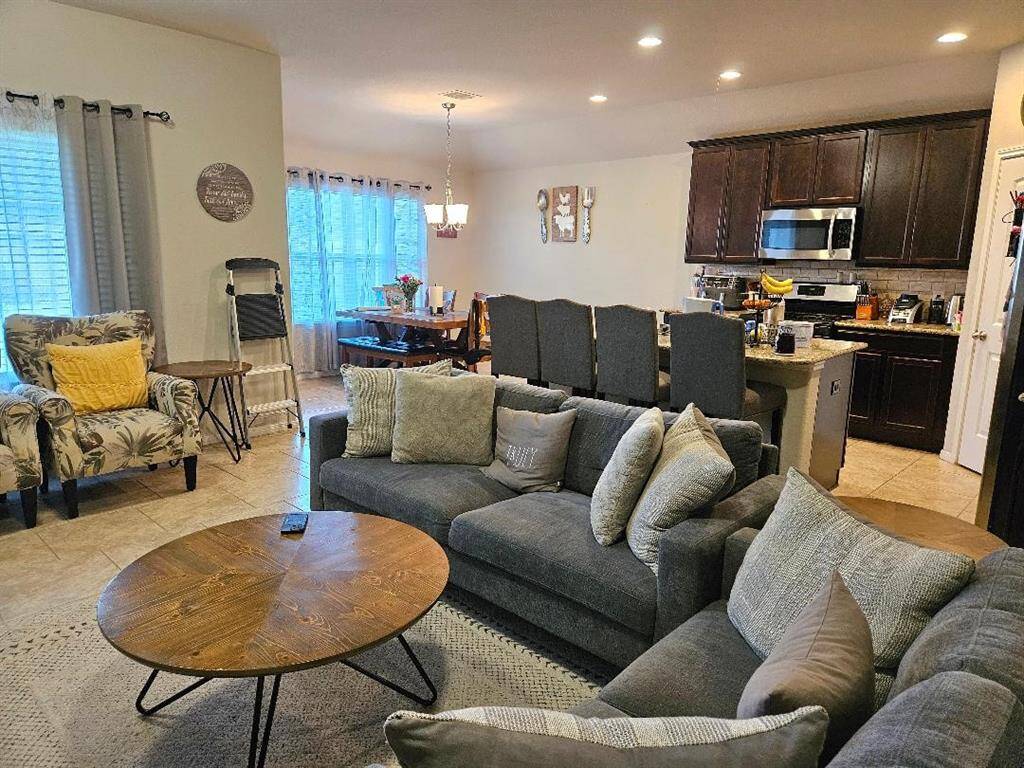 Wide shot of LIVING/KITCHEN.