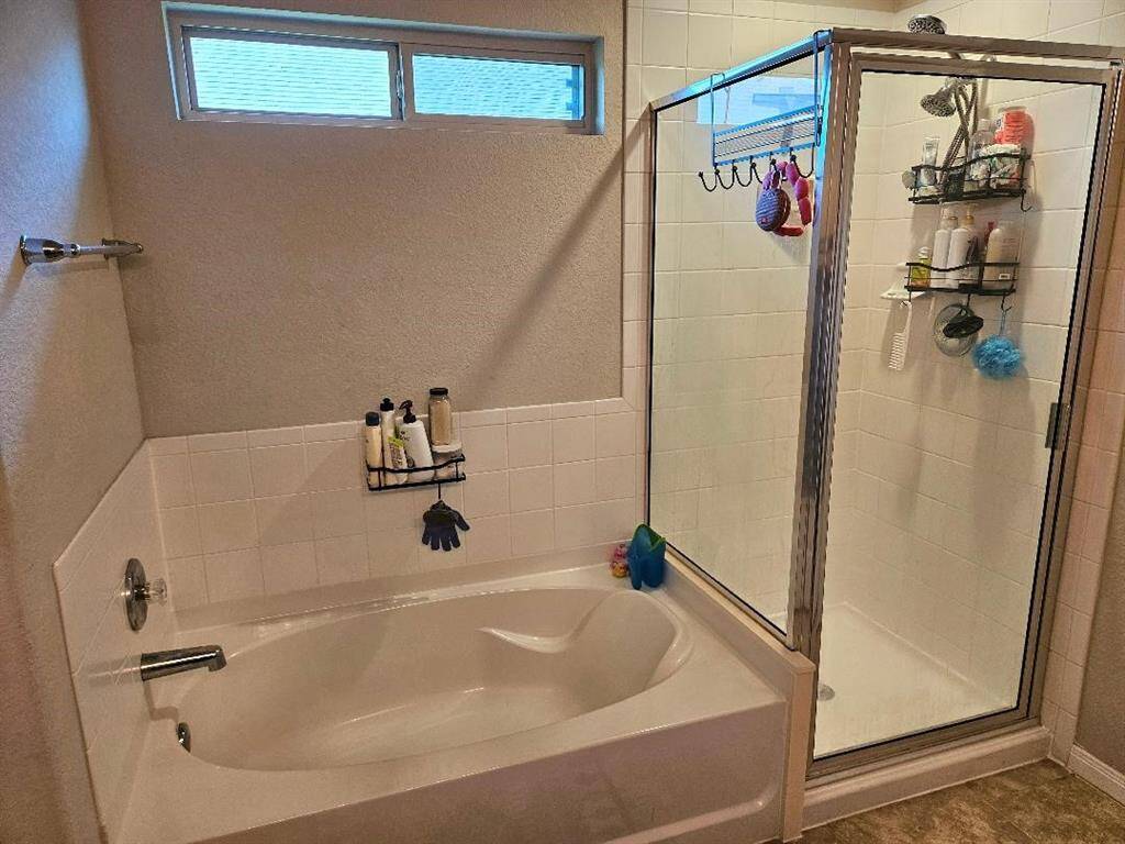 Master Bath with Garden Tub & Separate Shower.