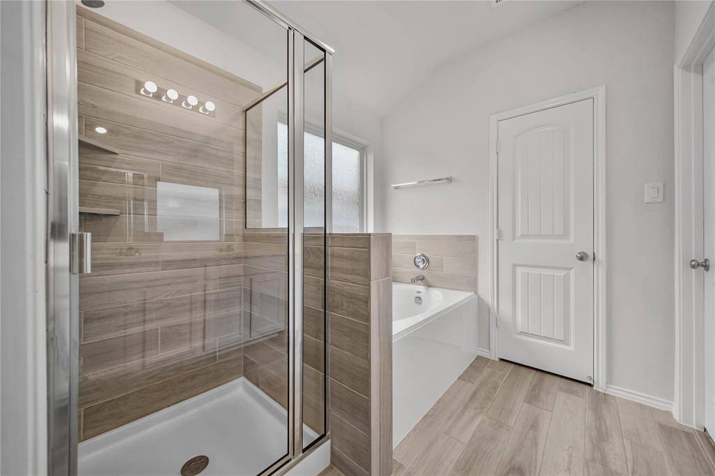 Secondary Bedroom 2 Offers High Ceilings.