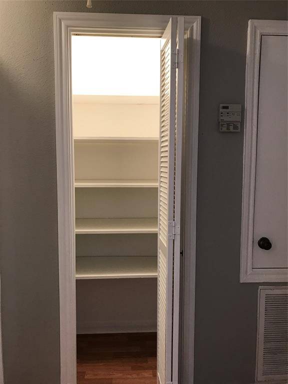 linens closet next to washer/dyer