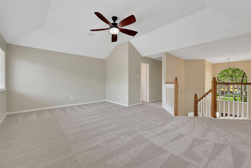 Upstairs gameroom with endless possibilities for entertainment and customization.