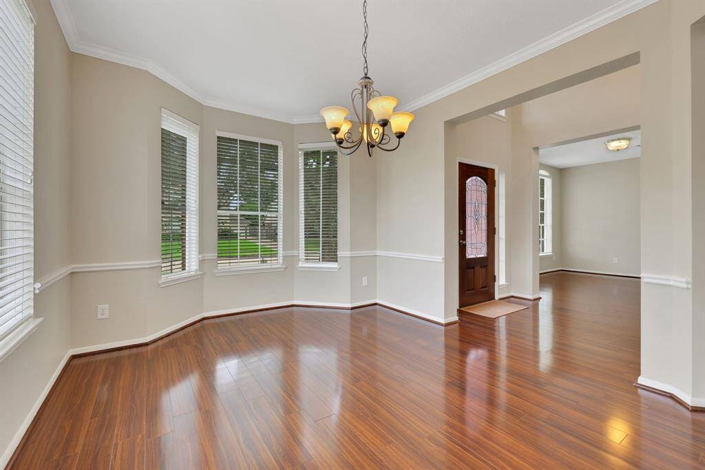 Elegant formal dining room, ideal for hosting memorable holiday gatherings and family dinners.