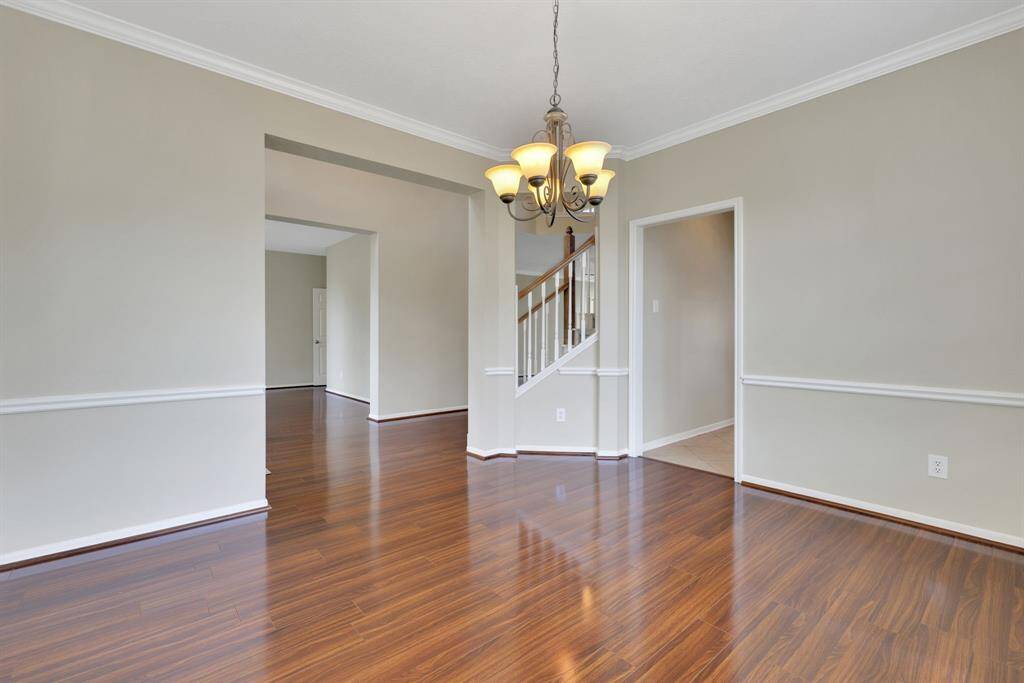 Another view of the formal dining room, seamlessly open to the kitchen for easy entertaining and flow.Open to the kitchen.