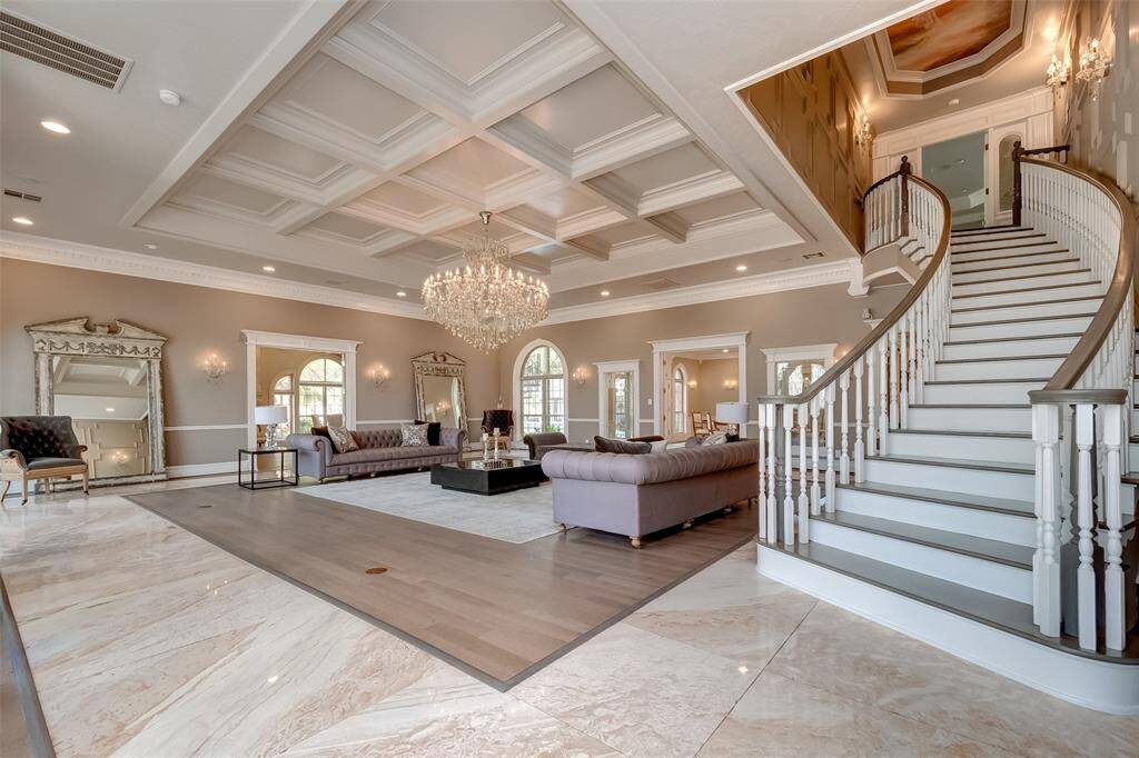 Elegant staircase leading to a luxurious master retreat.